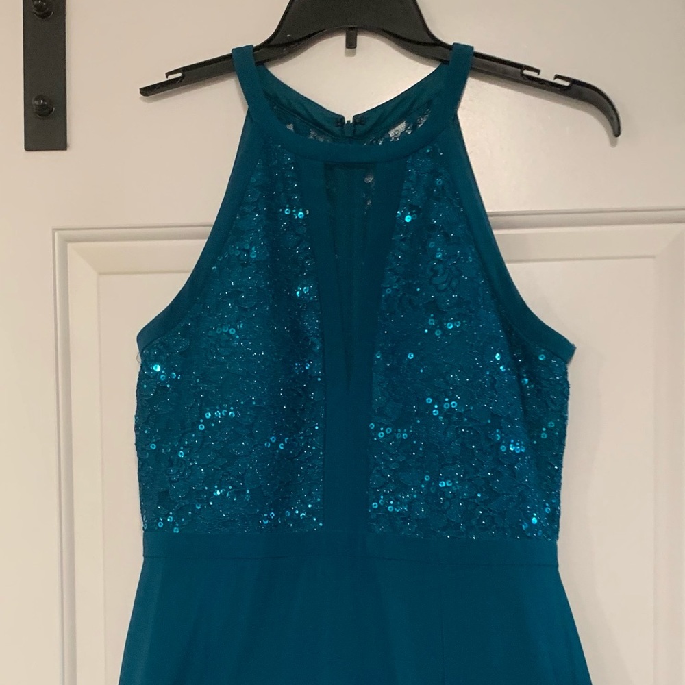 Nightway. Emerald green floor length gown.